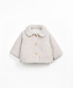 Fur coat with printed lining
