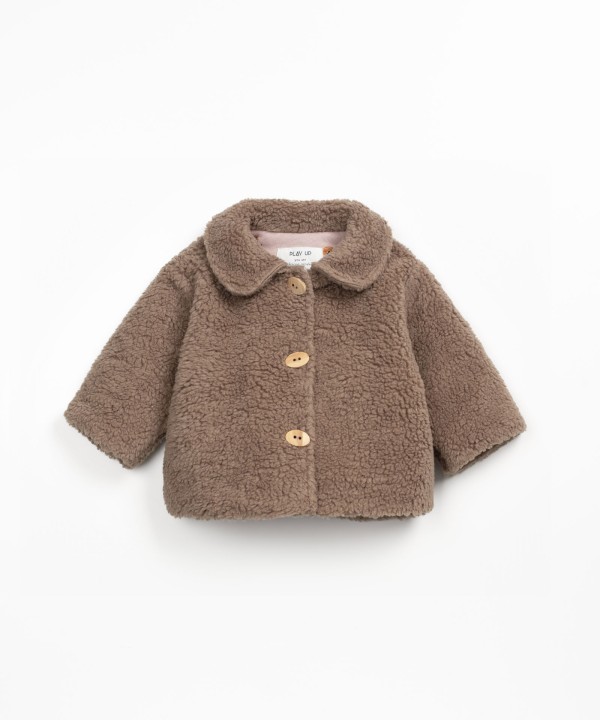 Fur jacket with wooden buttons