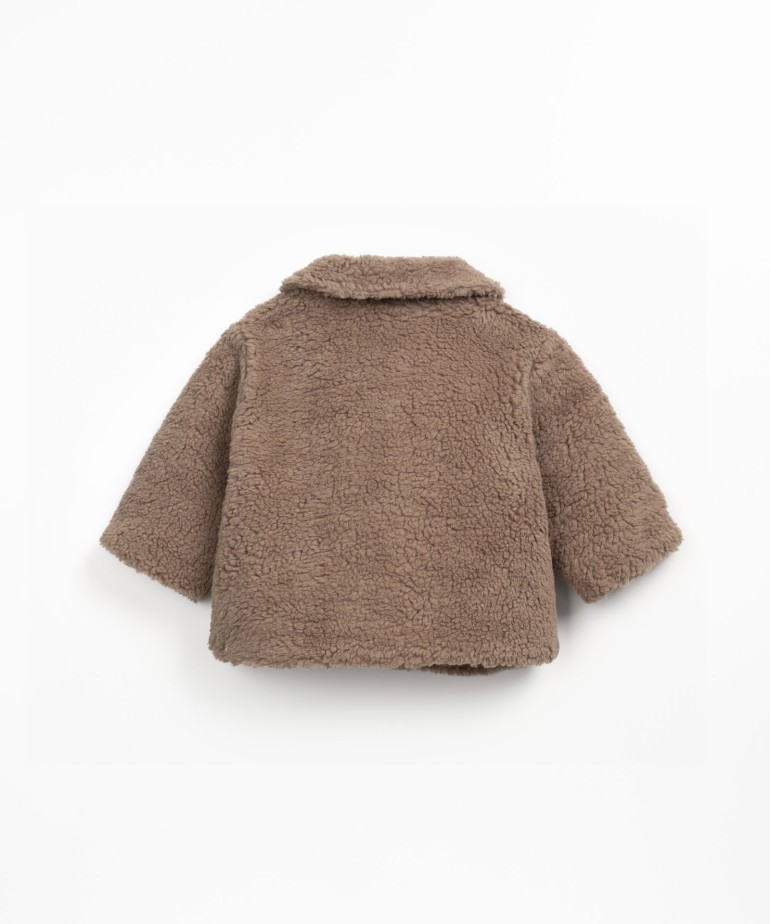 Fur jacket with wooden buttons