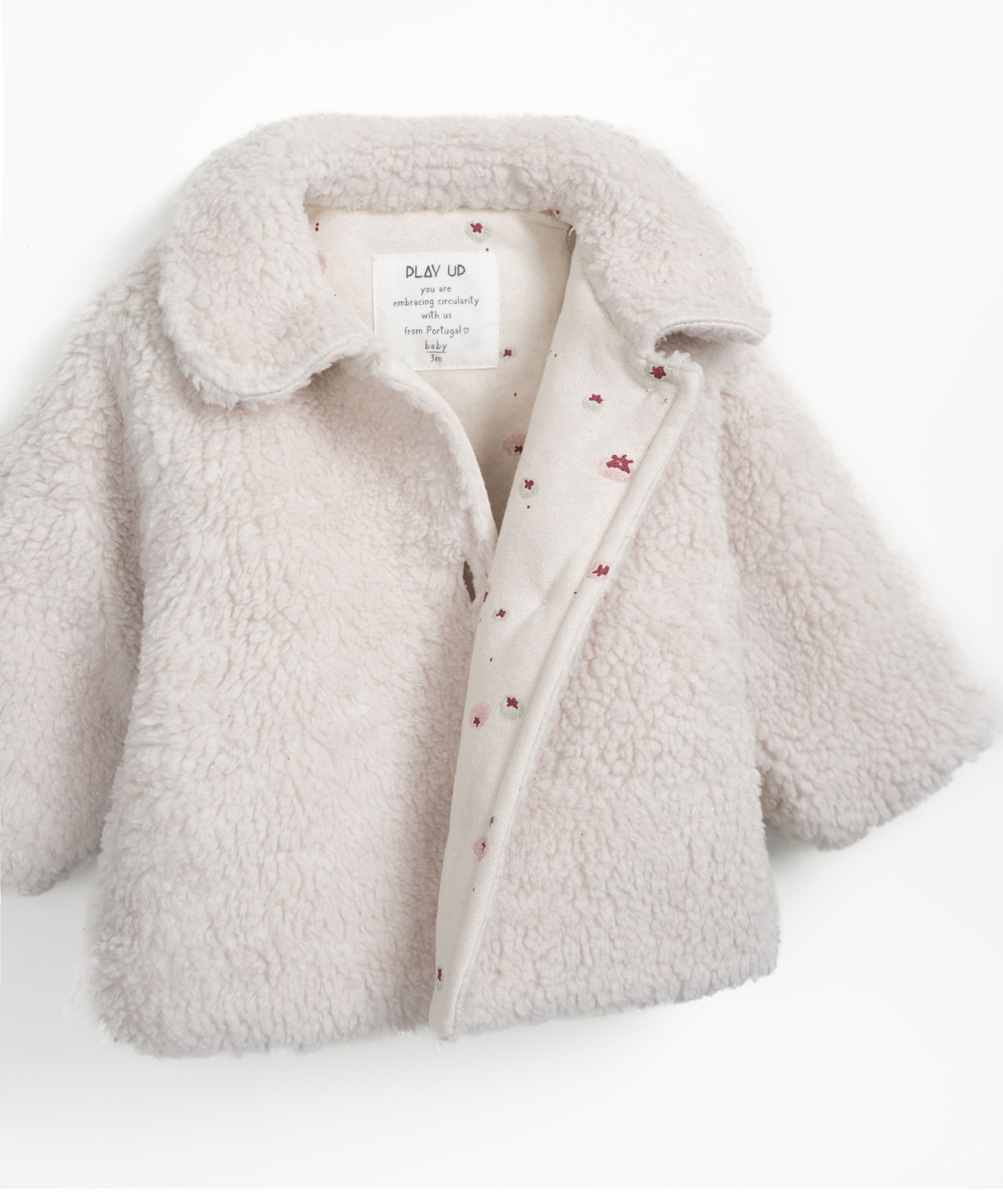 Fur coat with printed lining