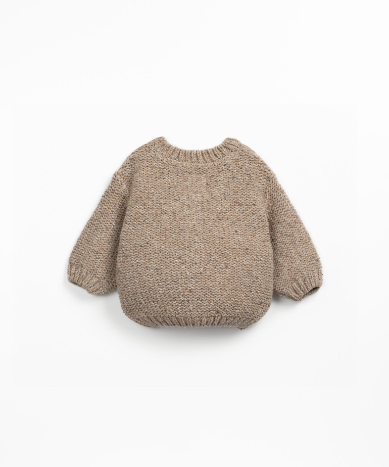 Knitted jacket with natural and recycled fibers