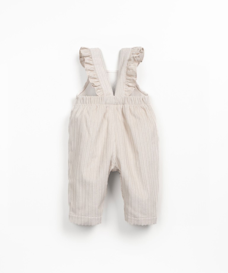 Corduroy jumpsuit with chest embroidery
