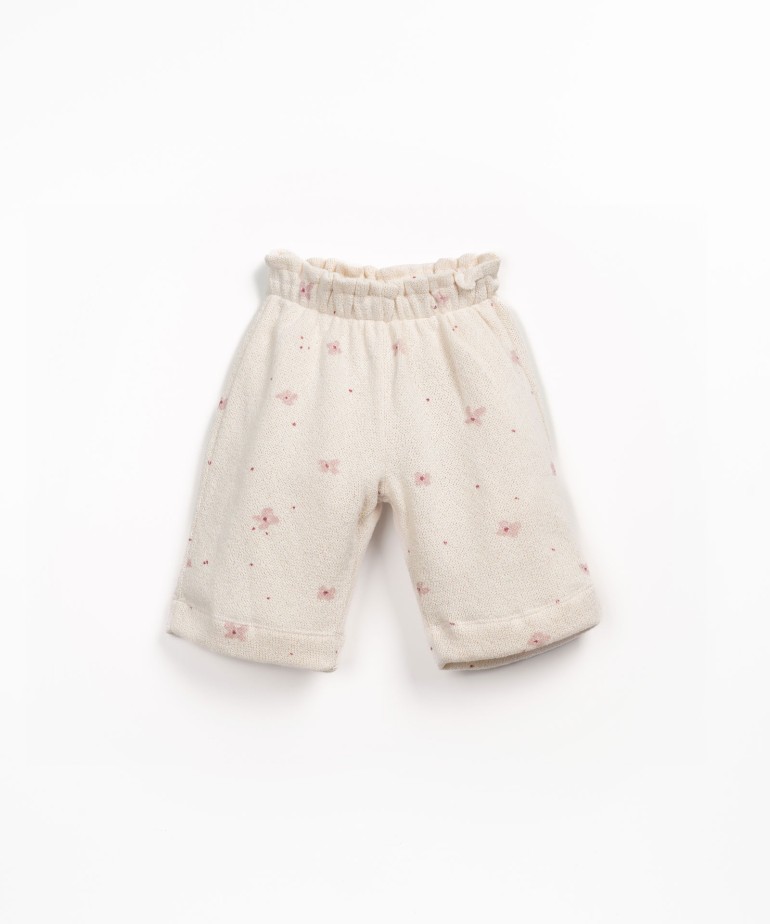 Knit trousers with flower print