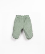 Corduroy trousers made from a blend of natural fibers and recycled fibers
