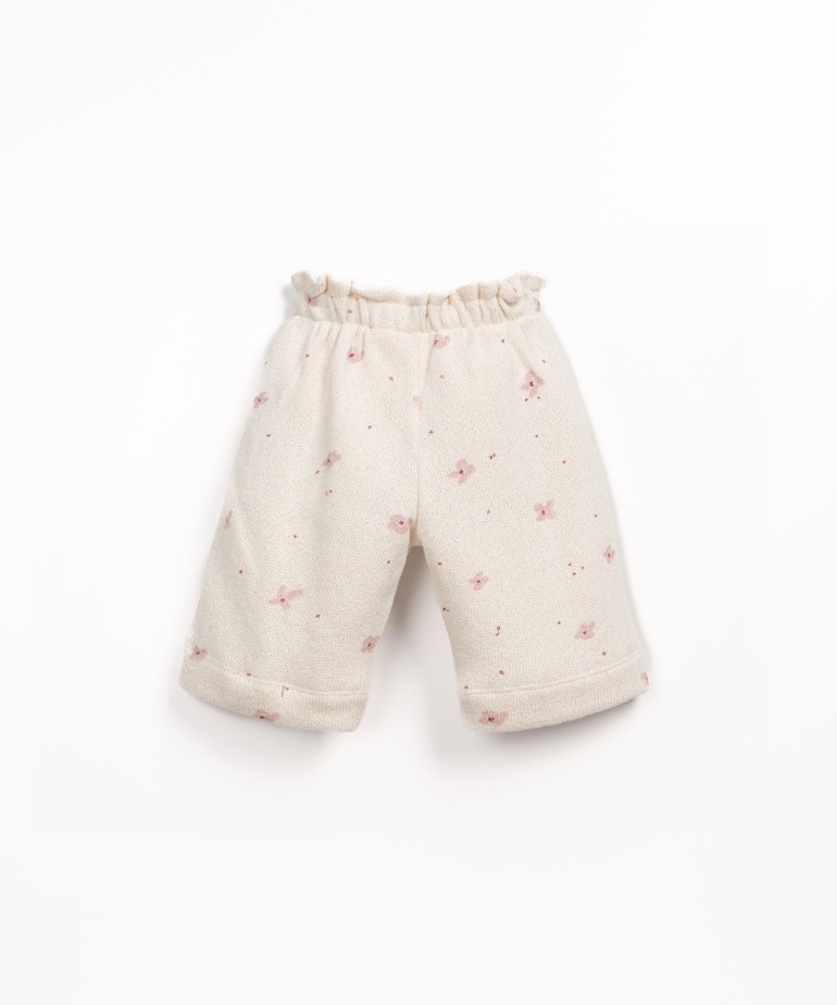 Knit trousers with flower print