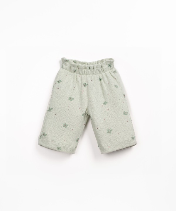 Pantaloni in maglina con stampa floreale