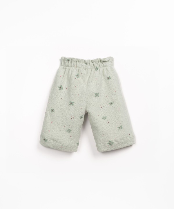 Pantaloni in maglina con stampa floreale