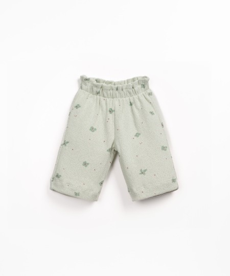 Pantaloni in maglina con stampa floreale