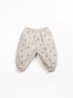 Printed cotton twill trousers with strawberry tree pattern