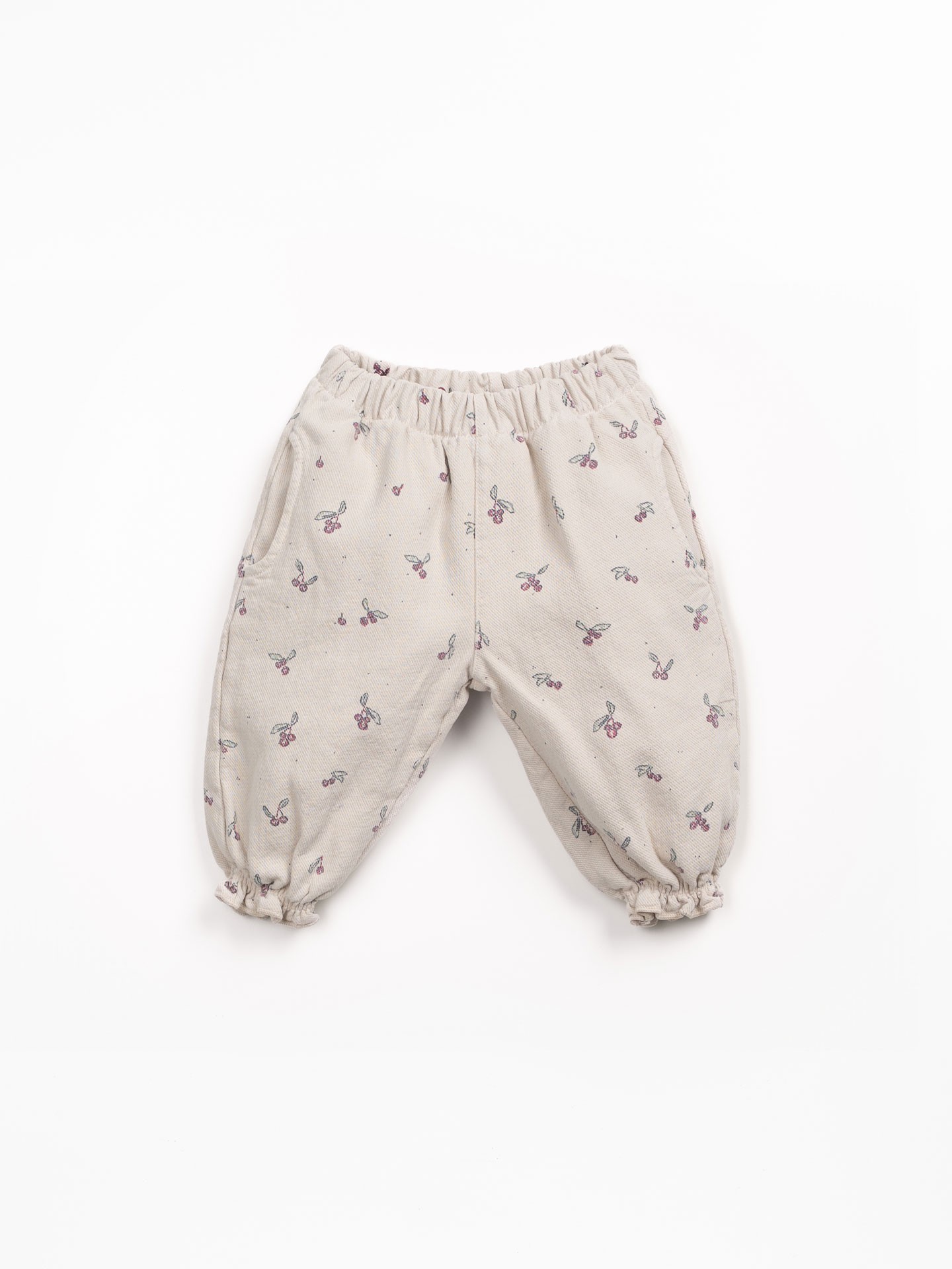 Pantalones de sarga con estampado de madroños