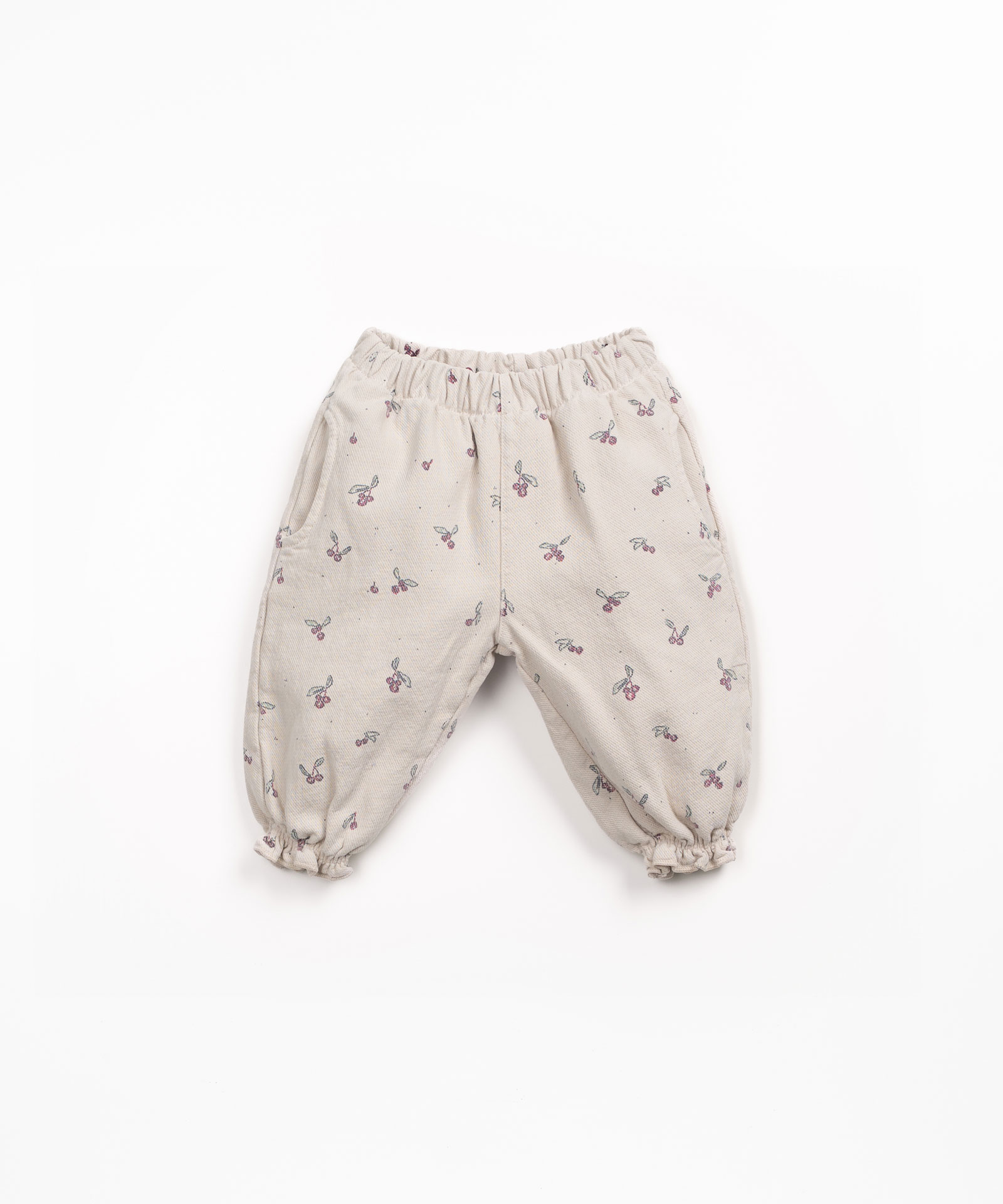Pantalones de sarga con estampado de madroños