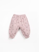 Printed cotton twill trousers with strawberry tree pattern