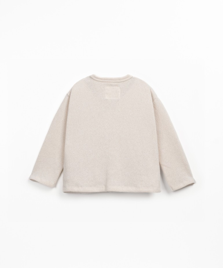 Knit cardigan with Re(Play) yarn