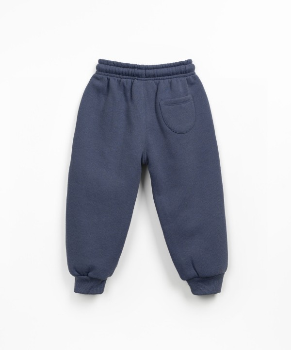 Jersey trousers with cotton, recycled cotton, and recycled polyester