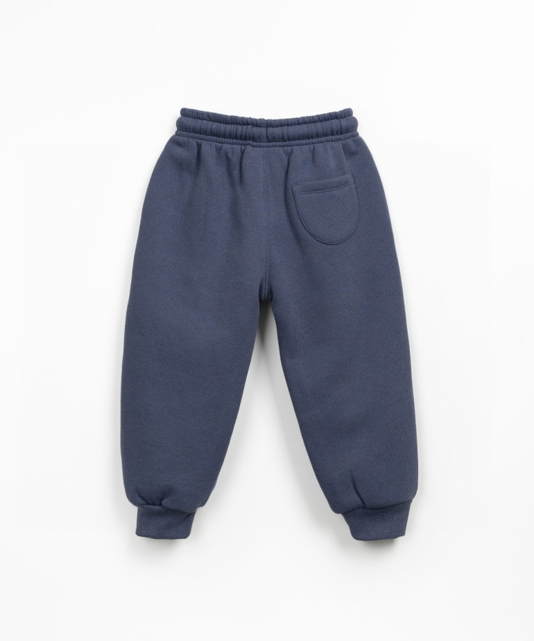 Jersey trousers with cotton, recycled cotton, and recycled polyester