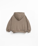 Sweater made with a blend of natural fibers and recycled fibers