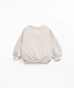 Sweater with a blend of natural and recycled fibers
