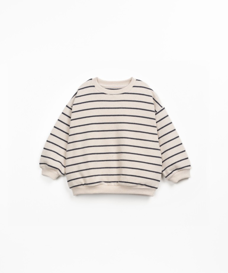 Striped knit sweater with cuffs
