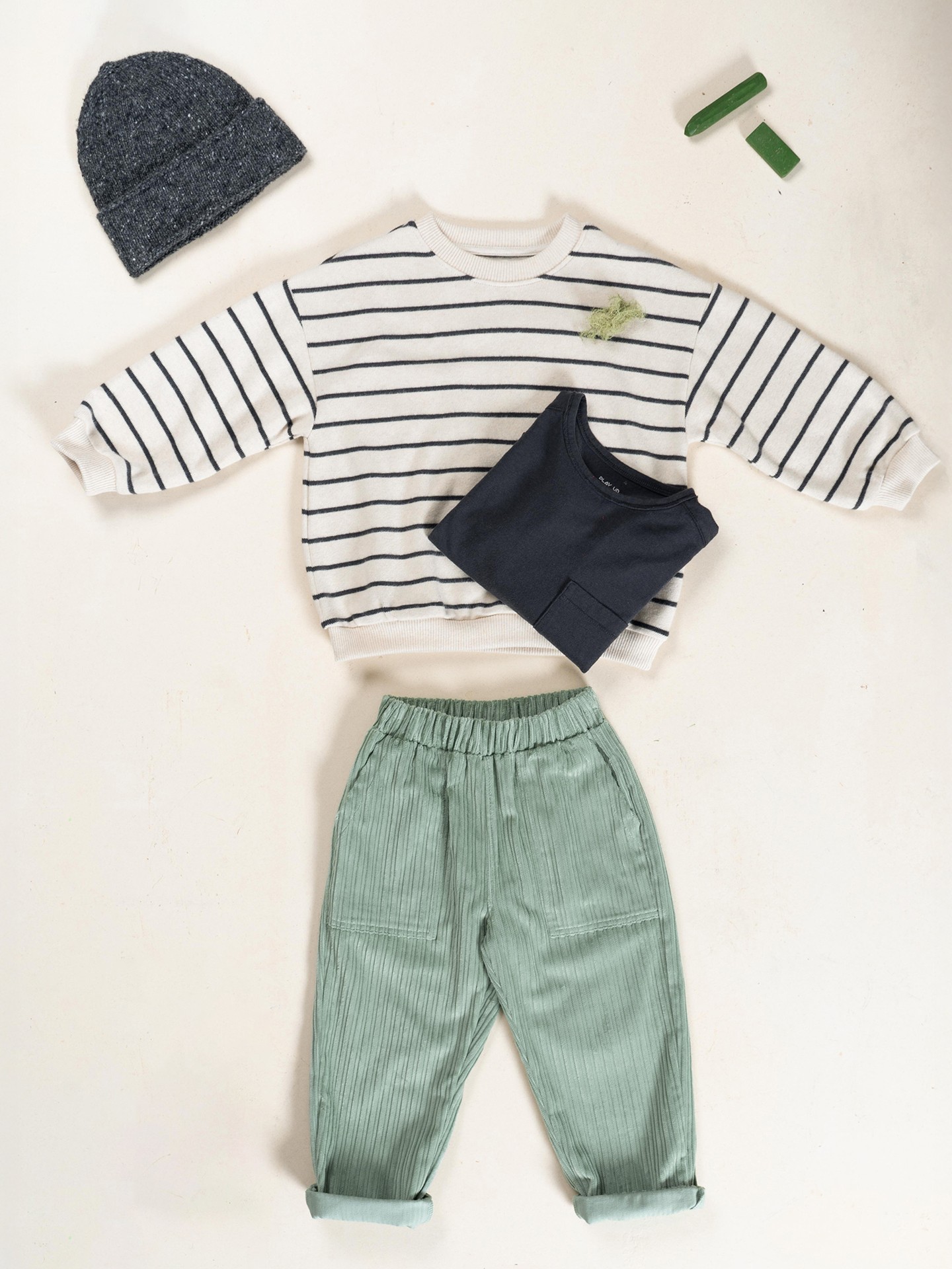 Maglione a righe con polsini