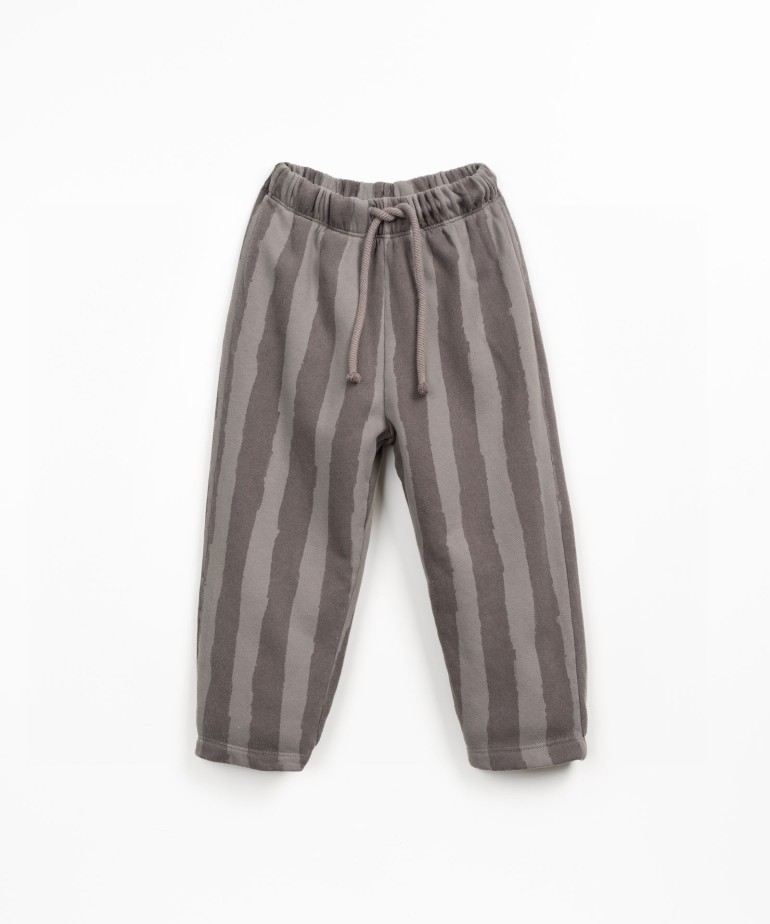 Trousers in natural fiber blend with print