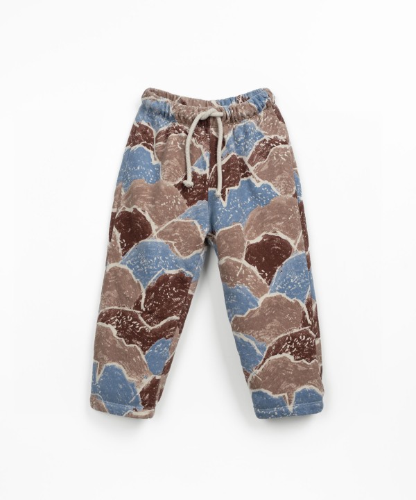Trousers in natural fiber blend with print