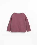 Knit sweater in organic and recycled cotton with applied front pocket
