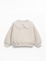 Sweater with a mix of natural and recycled fibers