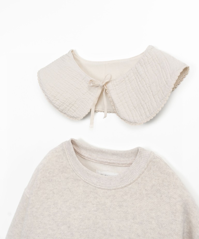 Sweater with a mix of natural and recycled fibers
