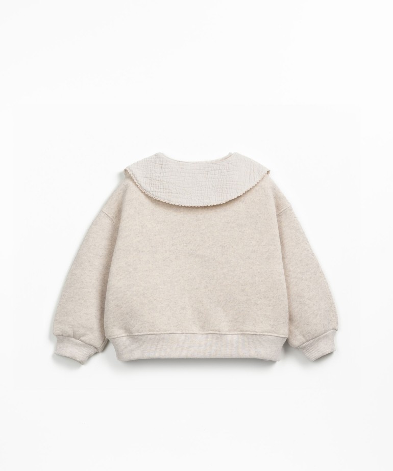 Sweater with a mix of natural and recycled fibers