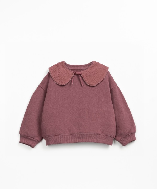 Sweater with a blend of natural and recycled fibers