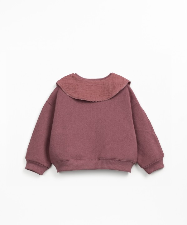 Sweater with a blend of natural and recycled fibers
