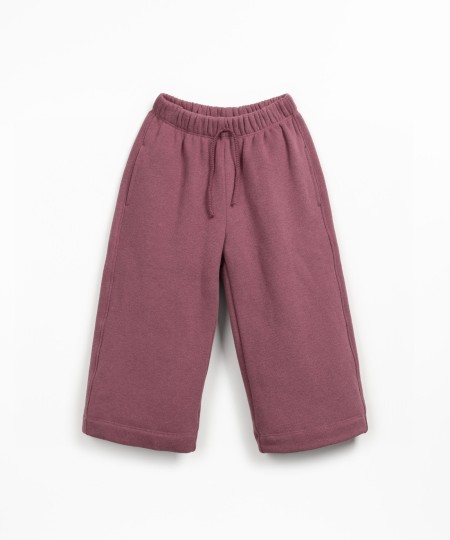 Fleece trousers with decorative drawstring