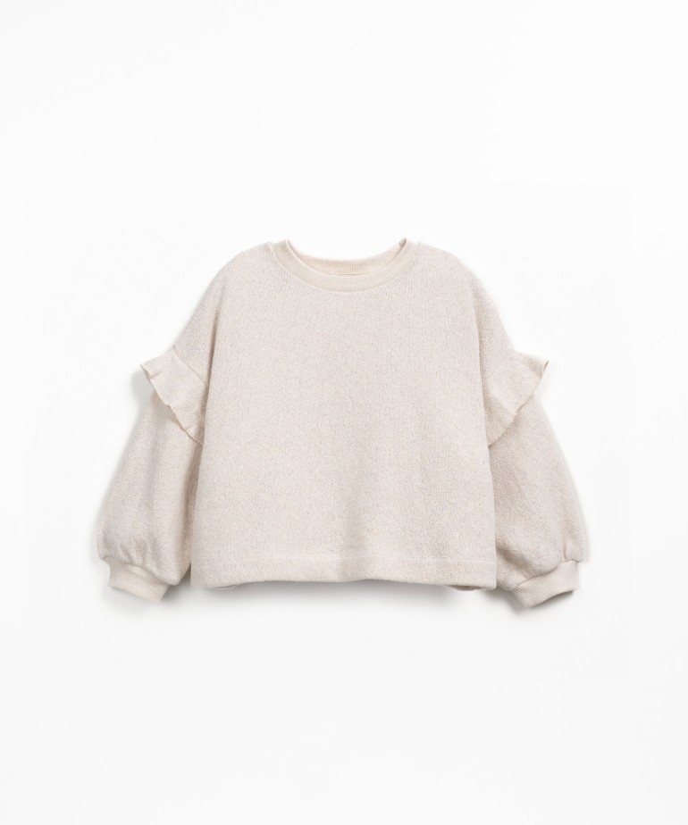 Knitted sweater in fiber blend