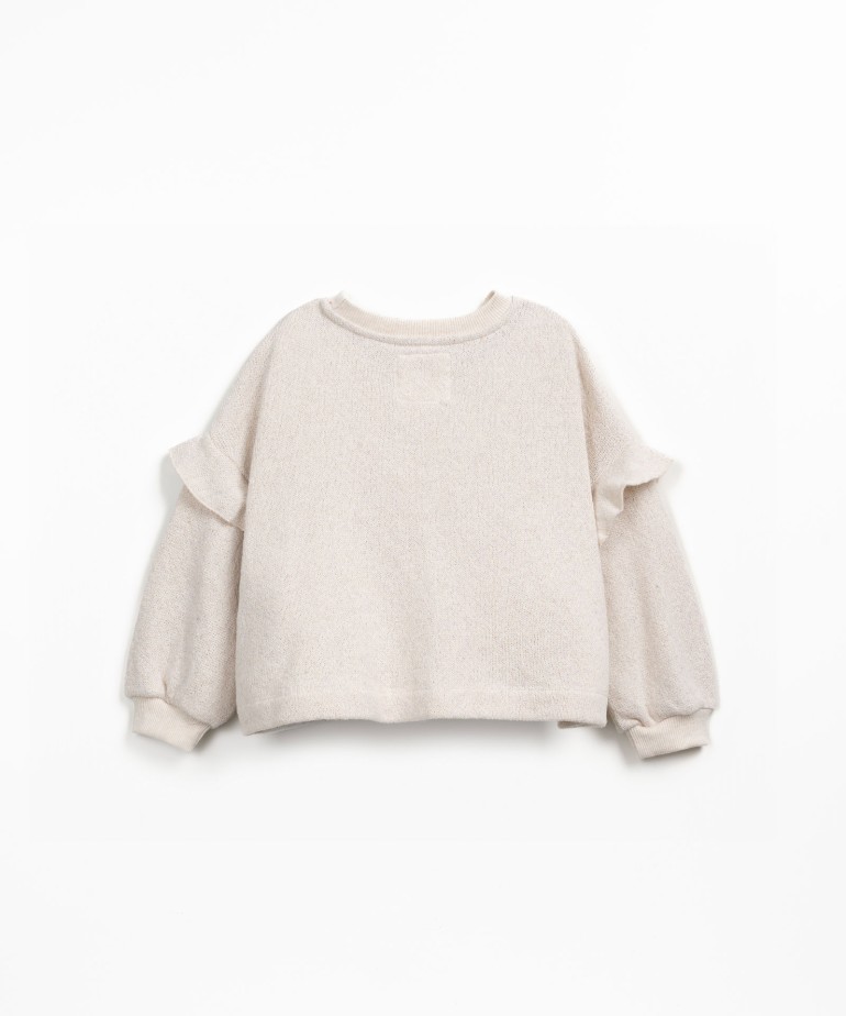 Knitted sweater in fiber blend