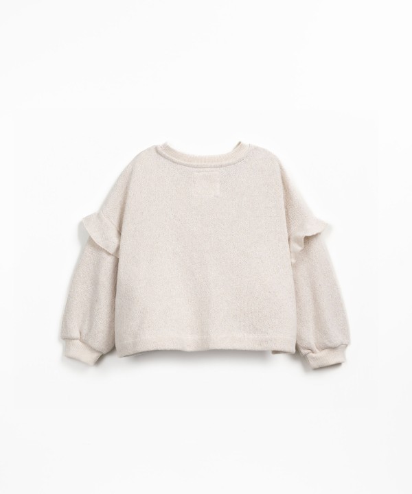 Knitted sweater in fiber blend