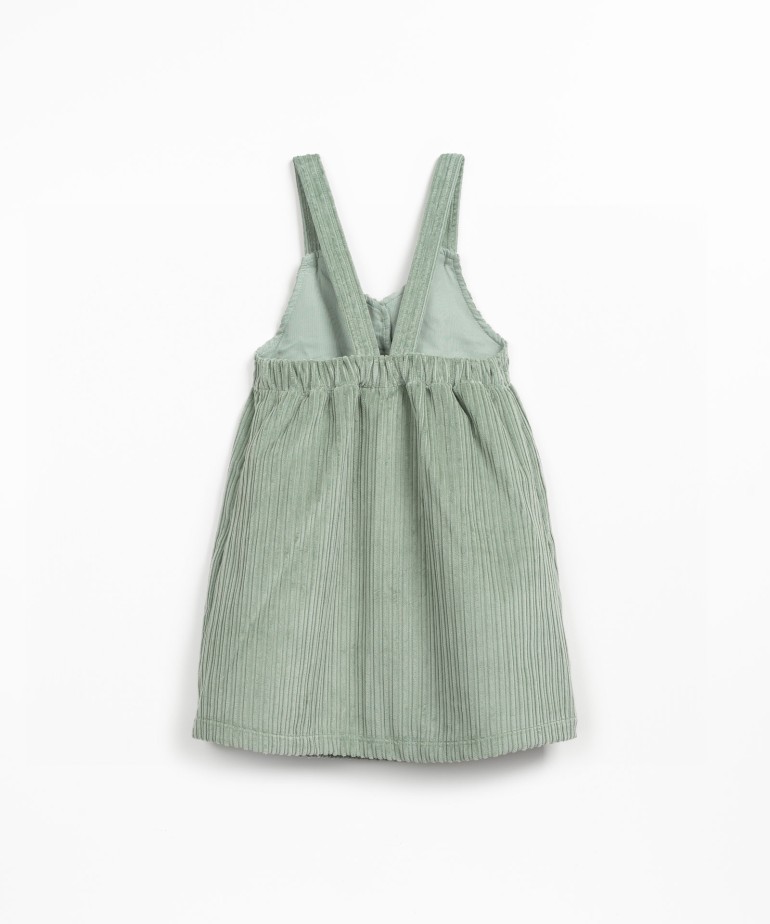 Abito in velluto a coste con apertura frontale