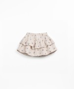 Falda pantaln de algodn con cintura elstica y volantes estampados