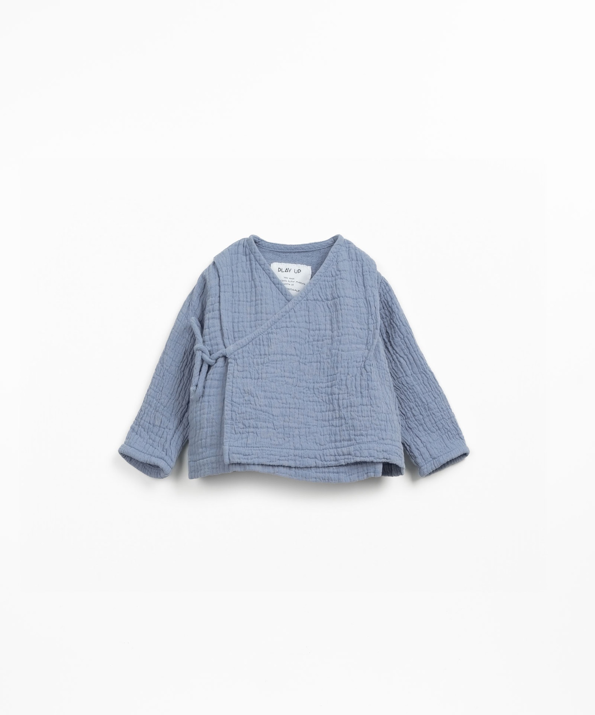 Blusa con cruce en tejido de algodn