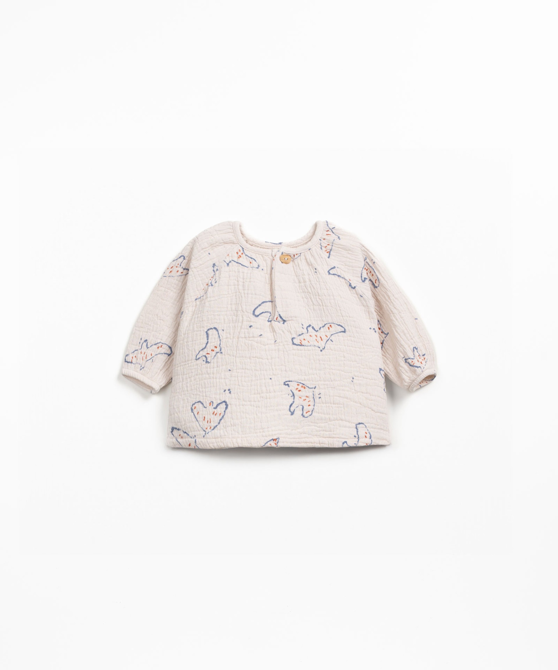 Blusa de tecido com estampado de pssaros