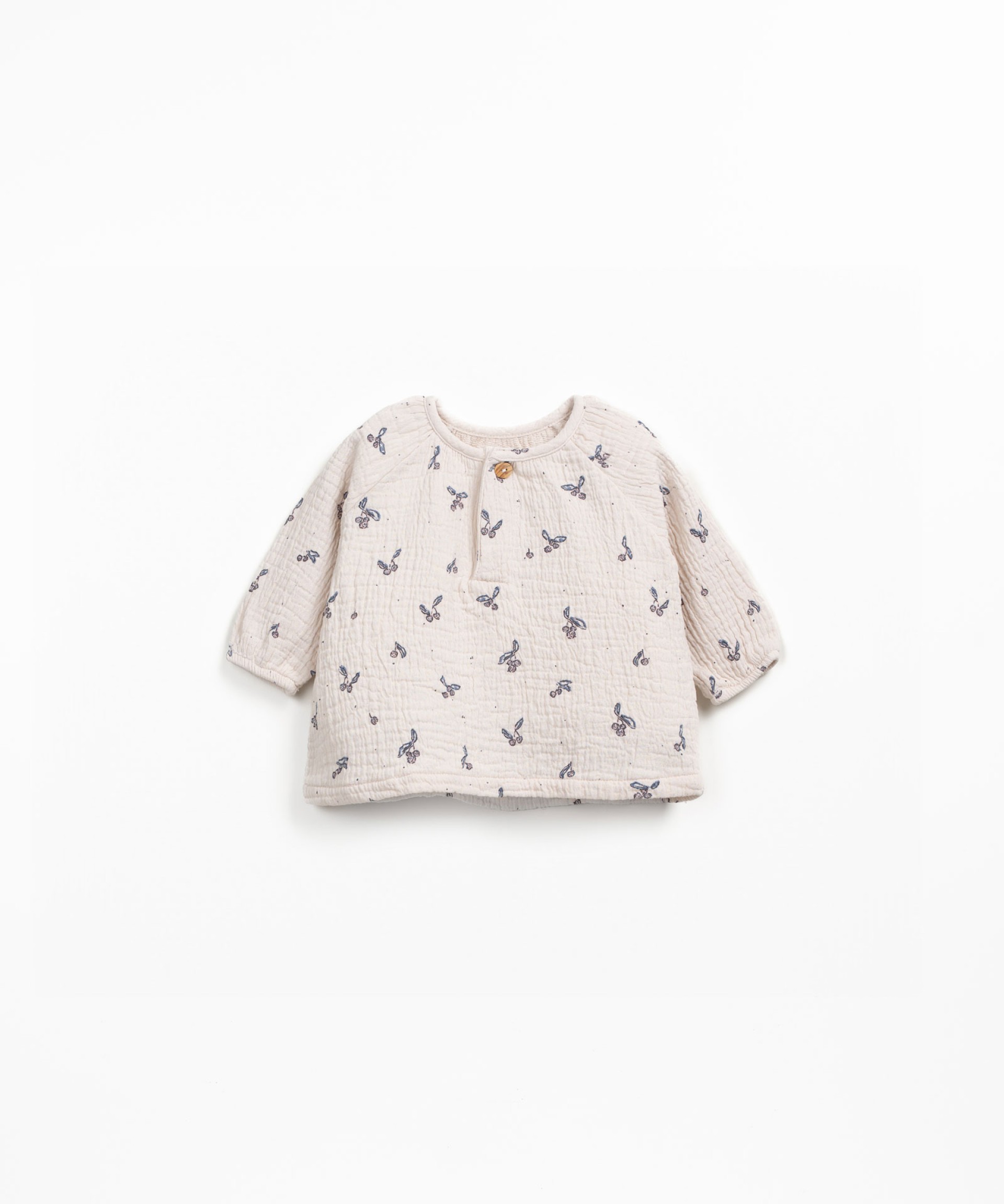 Blusa de tejido con estampado de madroos