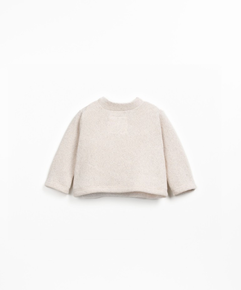 Knitted sweater in blend of regenerative cotton and recycled cotton
