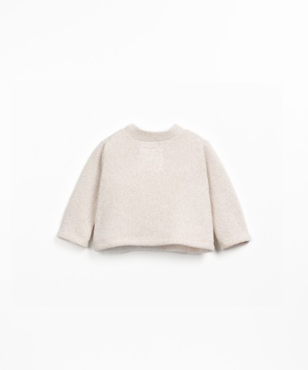 Knitted sweater in blend of regenerative cotton and recycled cotton