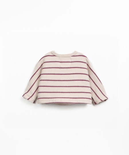 Knit sweater with a blend of natural fibers and recycled cotton