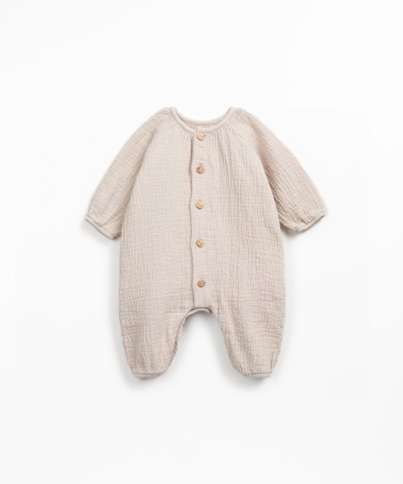 Macac�o de tecido em fibras naturais