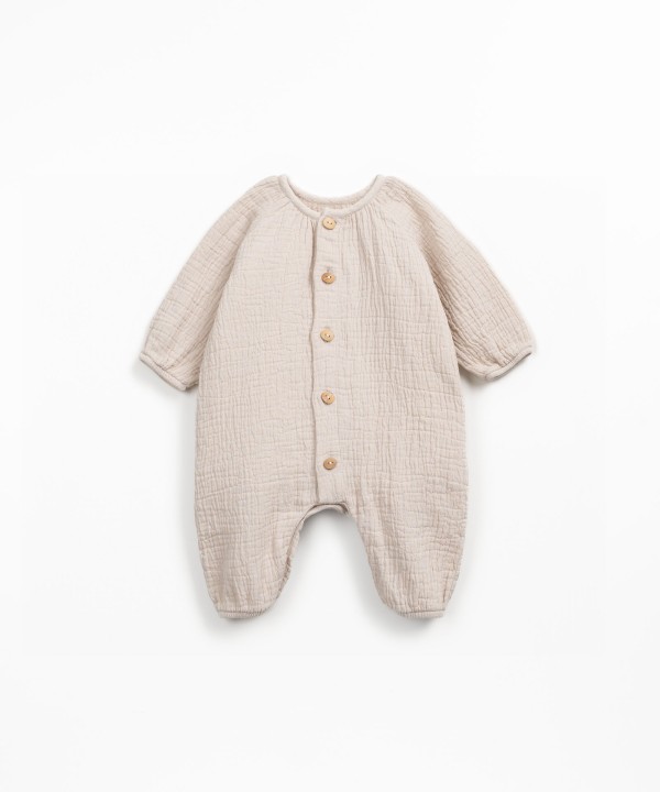 Macac�o de tecido em fibras naturais