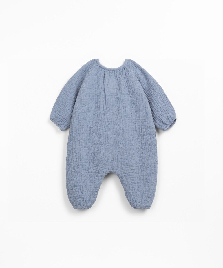 Mono de tela con fibras naturales