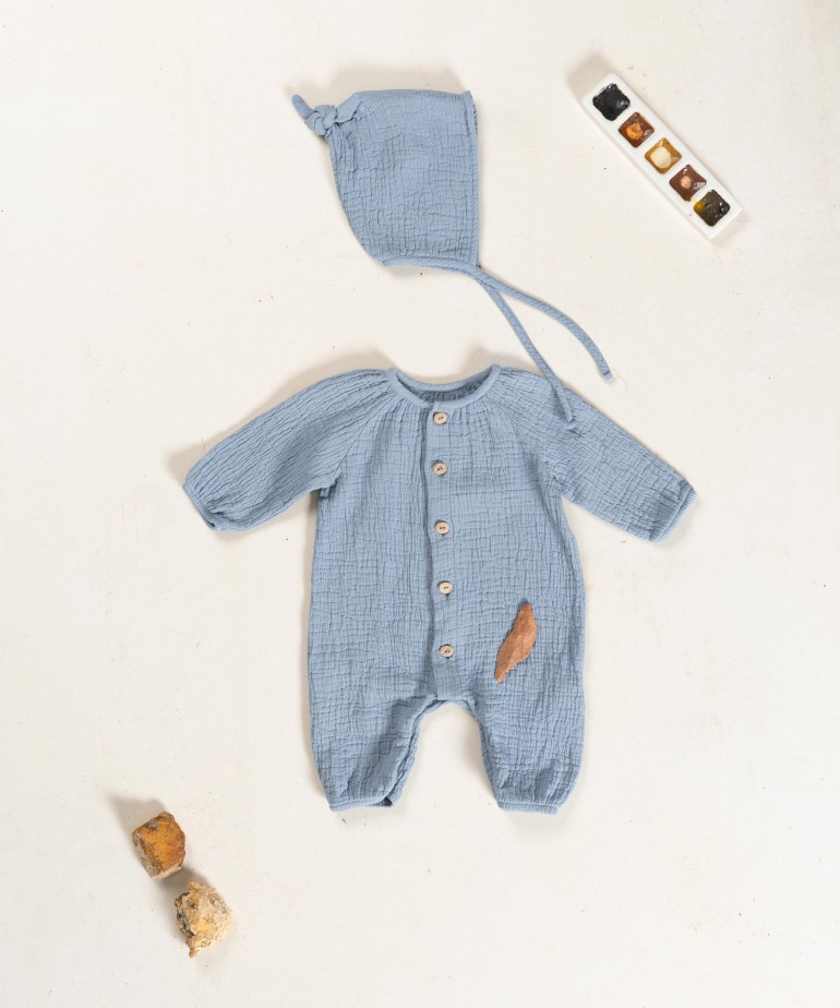 Mono de tela con fibras naturales