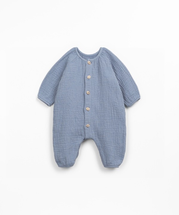 Macac�o de tecido em fibras naturais