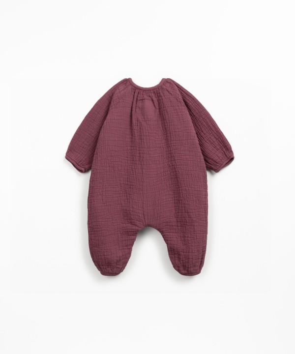 Macac�o de tecido em fibras naturais