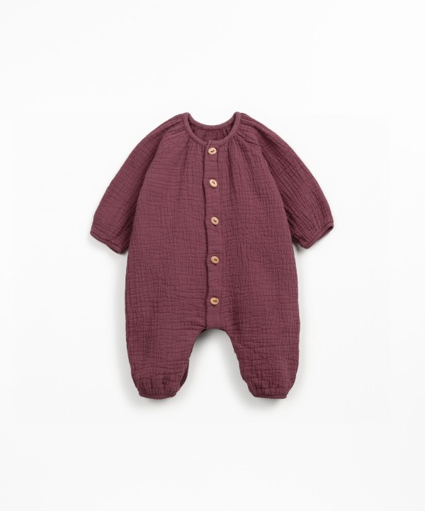 Macac�o de tecido em fibras naturais